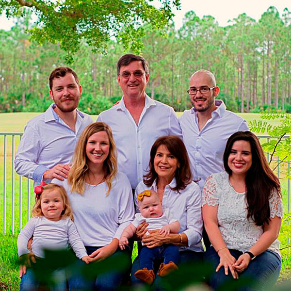Ubilla, center, with his family: sons Donoso, back left, and Alonzo, back right, daughter-in-law Caitlin, left, wife, Liliam, center, and daughter, Mariana, right, along with granddaughters Matilda and Noa. 