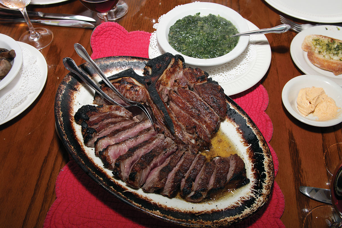 32-ounceT-bone steak, creamed spinach, garlic bread and Liptauer butter