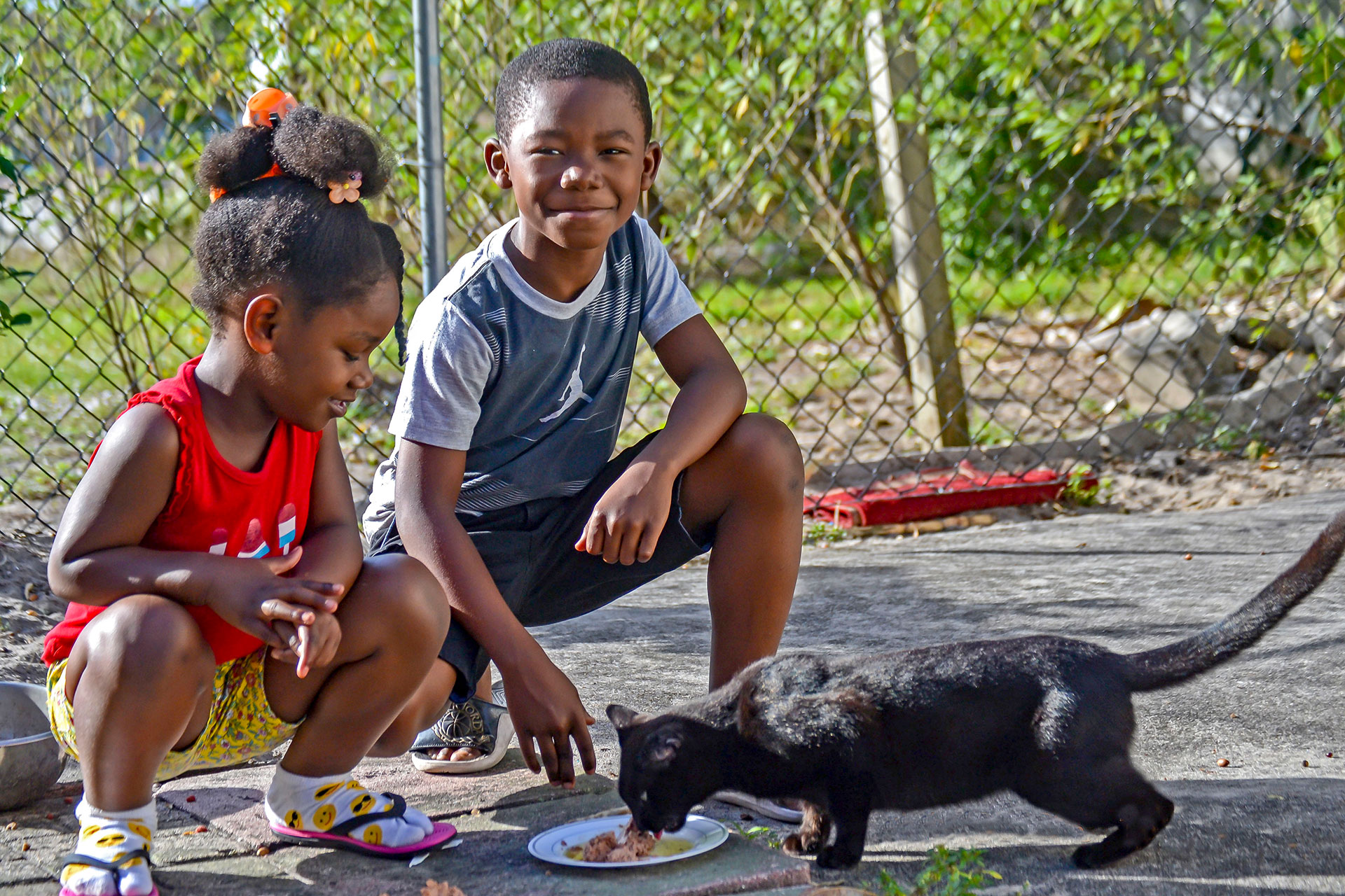 Neveah Edmond, 4, and Edson Edmond, 8, learn humane treatment of animals
