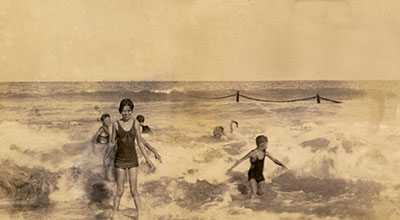 Children frolic in the surf on Vero Beach in the 1930s