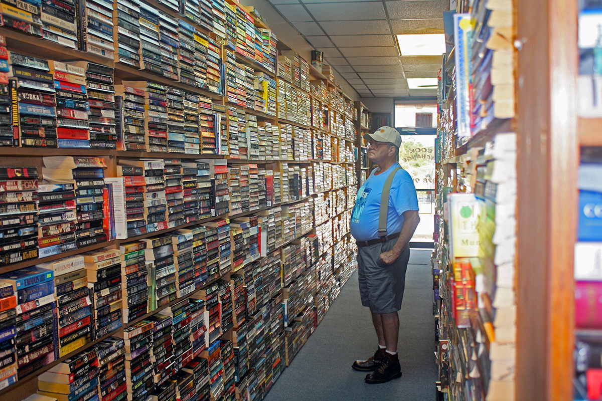 First-time customer John Hilkene peruses the varied used book selections