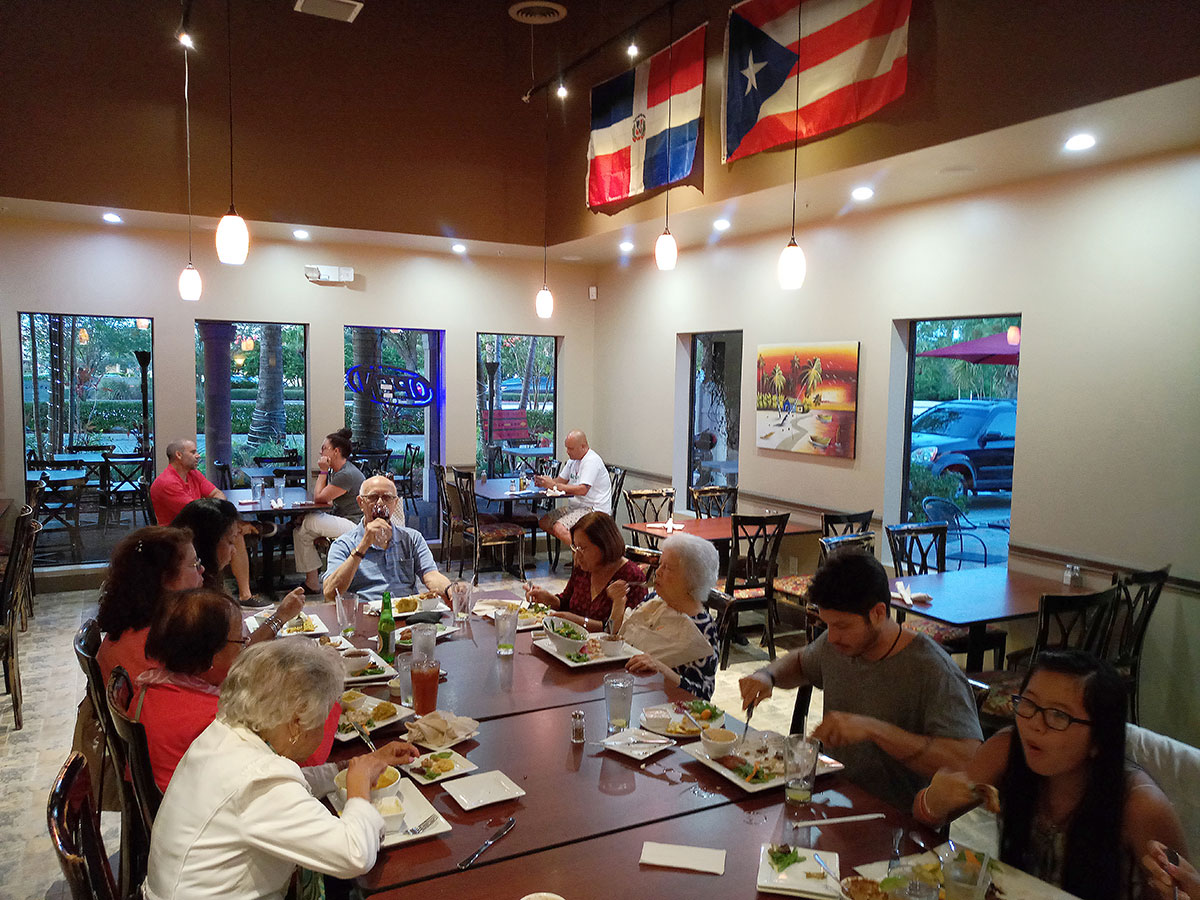 Restaurant-goers enjoy the rich flavors of the Latin dishes Dom Rico Cafe offers in its open and inviting dining space on Port St. Lucie Boulevard.