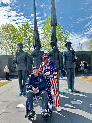 World War II veteran Richard Lewis of Port St. Lucie visits the WWII Memorial in Washington, D.C., with Singh