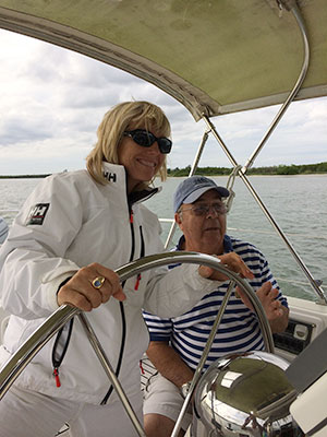 Rikki Eriksen sailing with her dad, Ron Grober. Grober died last year.