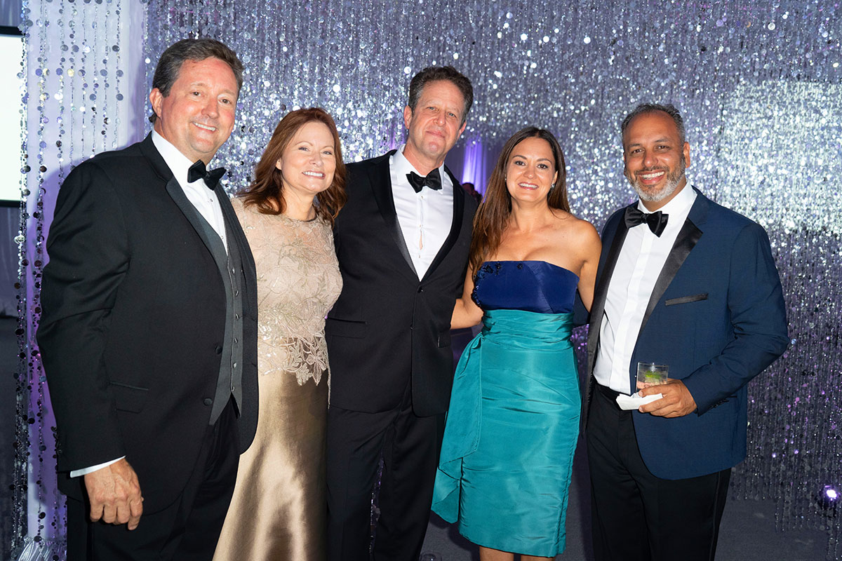 Robert and Beth Lord, Dr. Edward Savage, and Michelle and Dr. Wael Barsoum celebrate a night of successful giving at the 2018 ball.