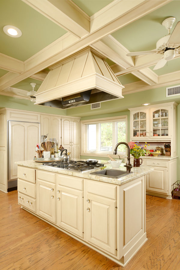 With intricate crown molding, the spacious chef-ready kitchen is set up to cook for large parties.