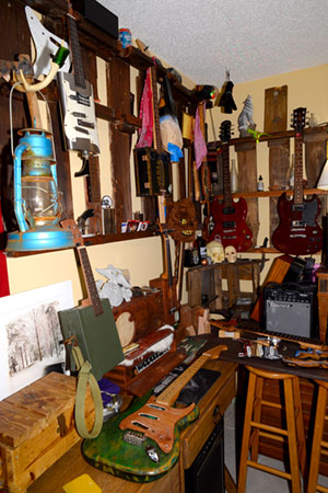 studio full of odds and ends and guitars