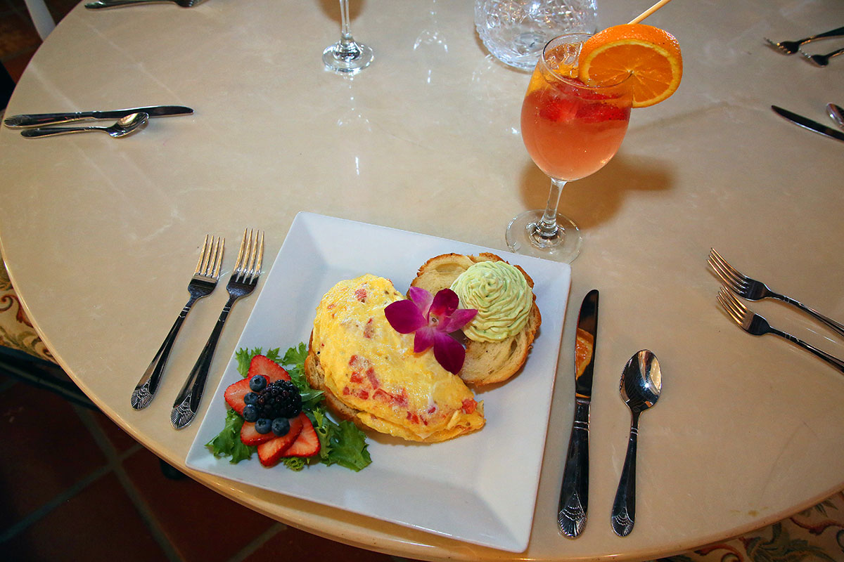 The Whipped Avo Croissant omelet and bottomless Sangria