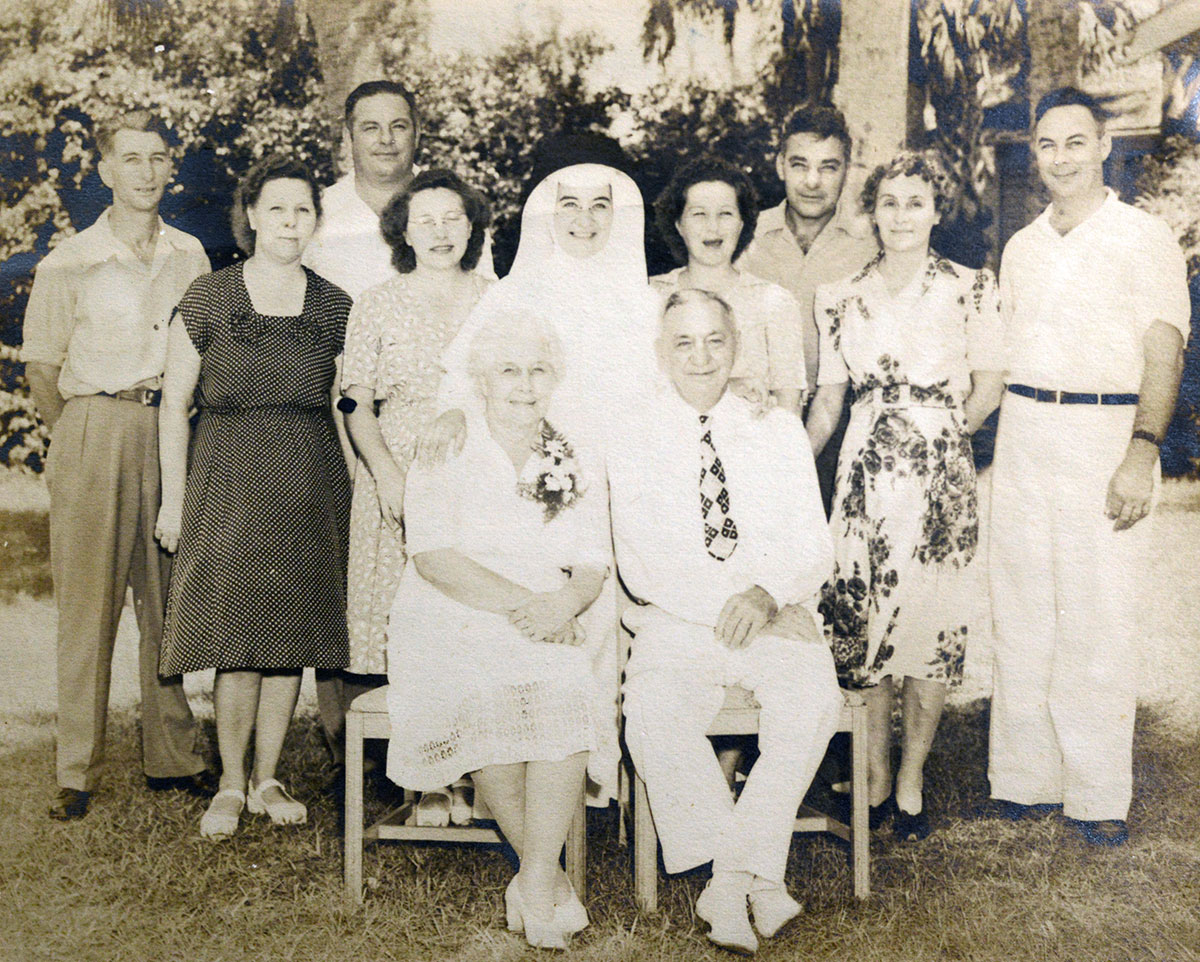 dward and Elizabeth Guettler sat for a portrait with their nine surviving children