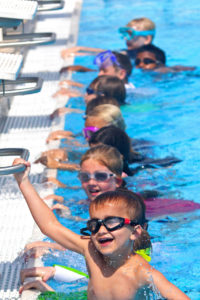 Children participate in an Aqua summer camp at the Anne Wilder Aquatic Complex