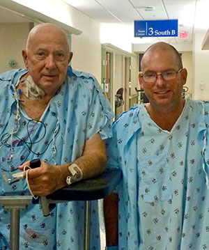 Bill Sedleckis, left, and Joe Kern walk the halls of the Mayo Clinic in Jacksonville