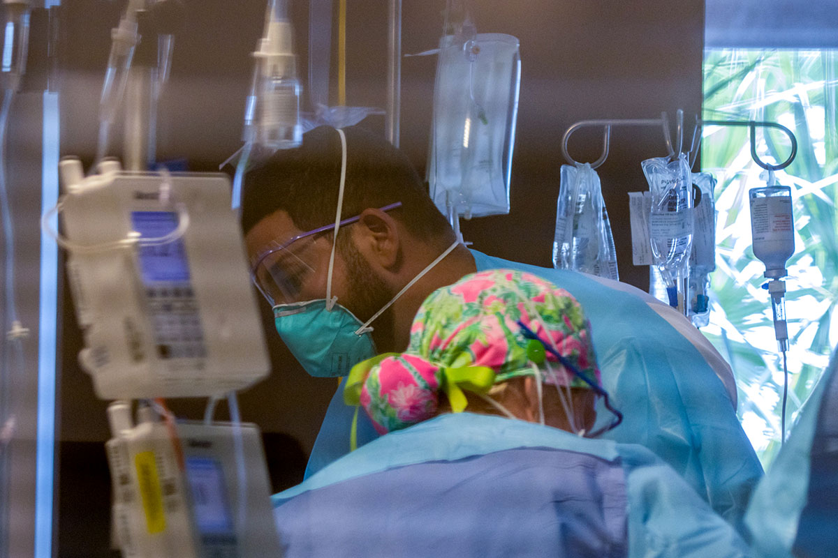 Medical staff in the Cleveland Clinic attend to ICU patients in late August