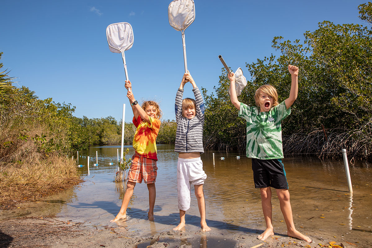 Youngsters express their enthusiasm for the seining activity 
