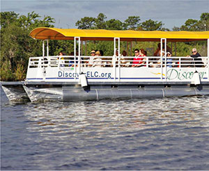 Visitors on the ELC's pontoon boat Discover