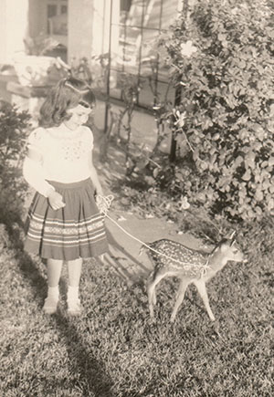 Kathy Sloan with Moses a rescued deer