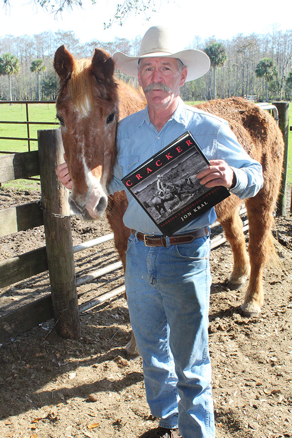 Buddy Mills with Spur and the book by Jon Kral