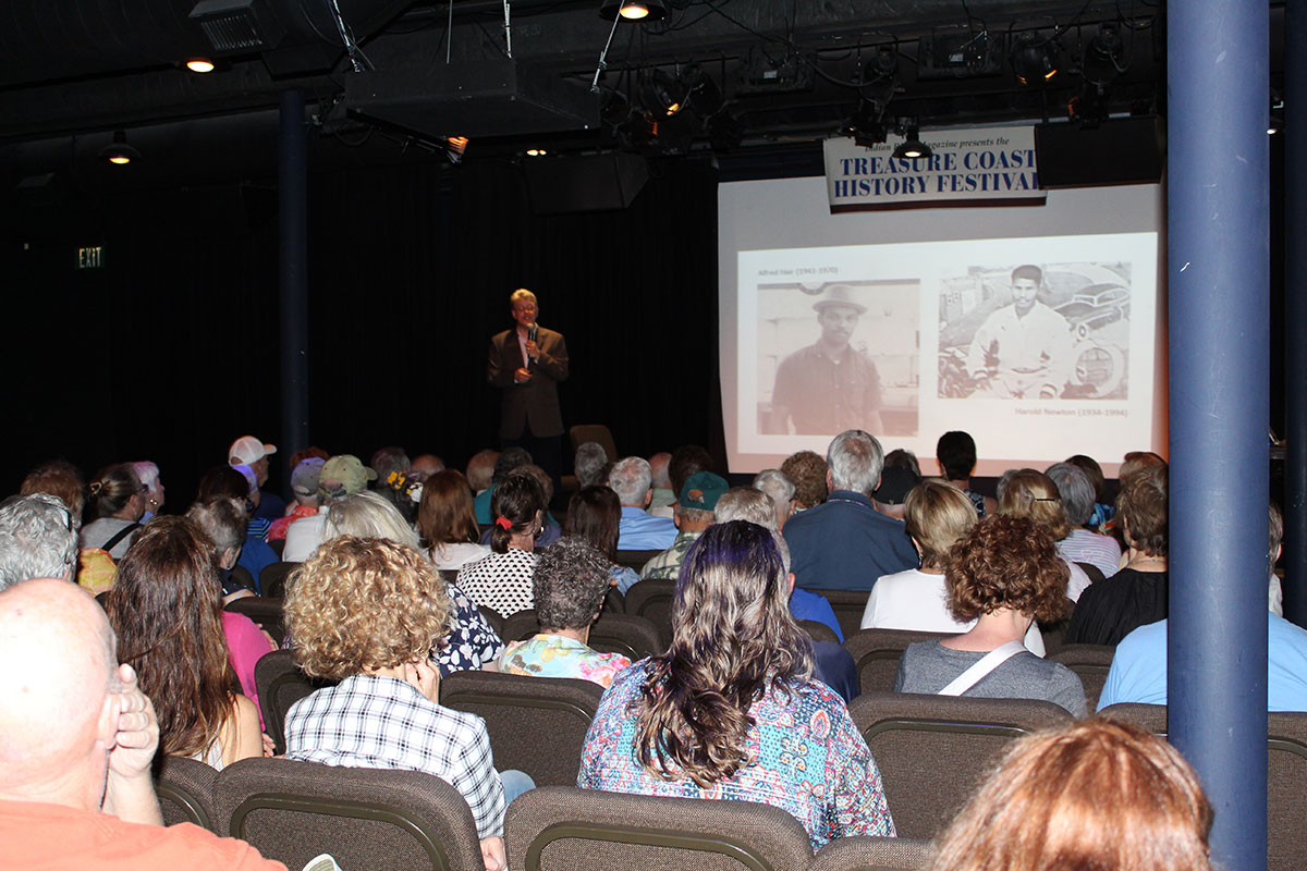  Attendees hear a presentation on the Highwaymen artists during a previous History Festival. 