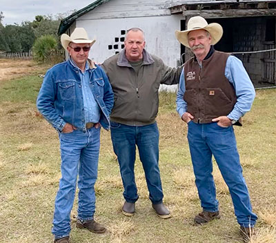 Cow Creek Chronicles writer Gregory Enns, center, reunites at Cow Creek with Deroy Arnold and Buddy Mills after nearly 50 years.