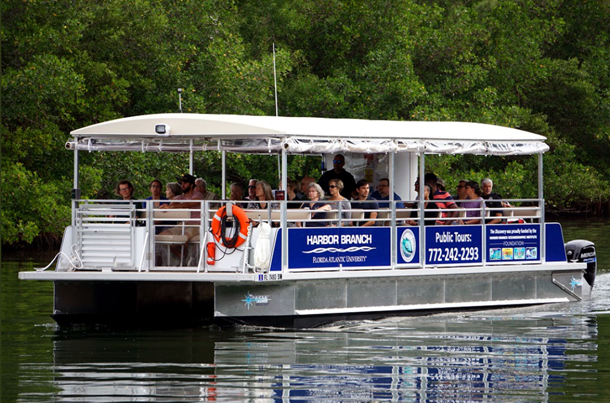 Harbor Branch Oceanographic Institute takes passengers on its pontoon boat
