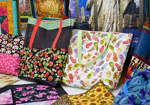 Handmade items such as tote bags, cup holders, pillowcases and much more are brought in by members to be sold at the boutique in the quilt show.
