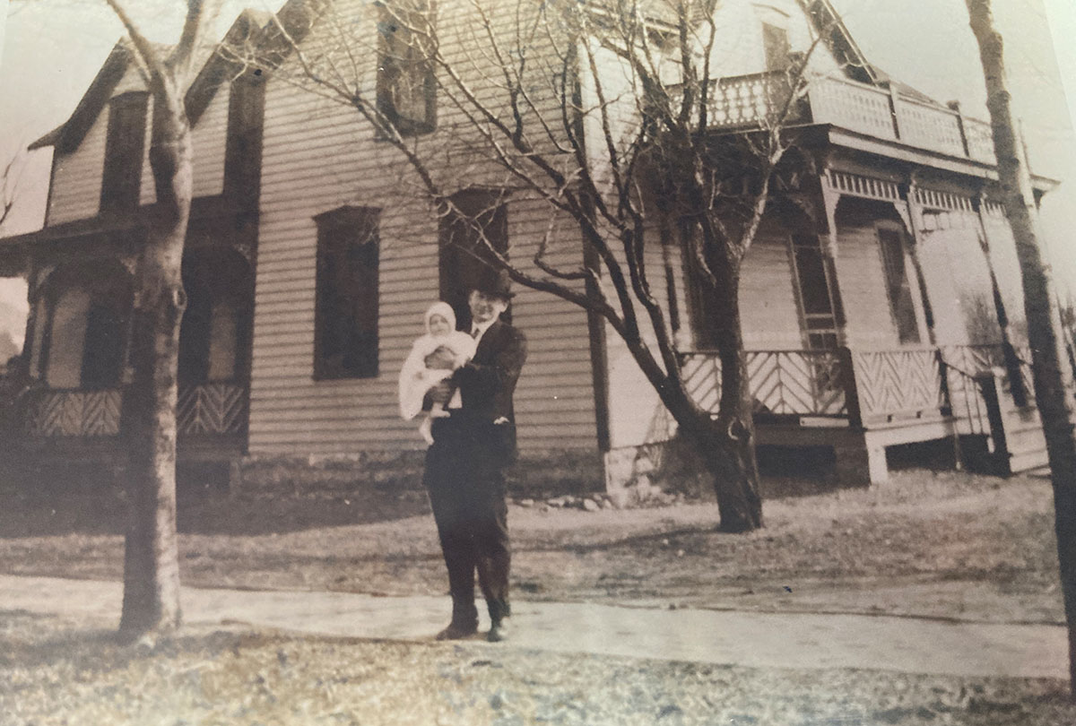 Dr. Jacob Enns and son Gene in front of Grossmom’s house about 1915