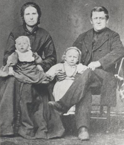 Elizabeth Martens Enns and Cornelius Enns with their children, John and Dietrich, about 1879