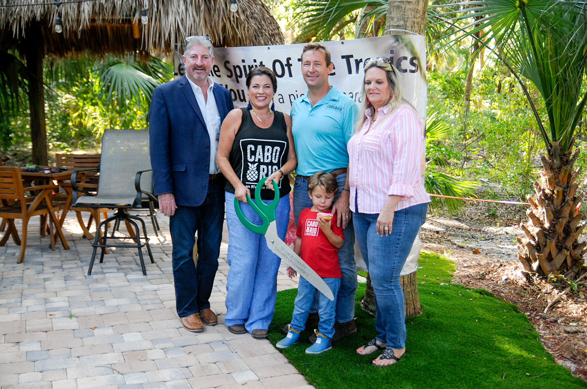 St. Lucie County commissioners Larry Leet and Cathy Townsend welcome Cabo Rio RV Resort co-owners Jim and Carrie Chalmers and son Callan at a chamber of commerce ribbon-cutting ceremony on June 7.