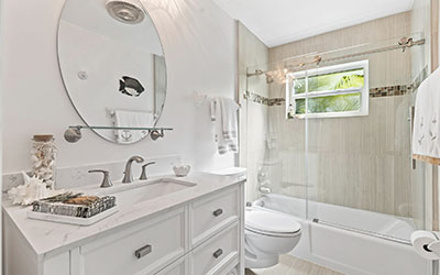 One of the guest bathrooms shows the quality of the home’s finishes, fixtures and other features.
