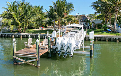 Described as a ‘boater’s paradise,’ the home’s 48-foot dock includes a 16,000-pound boat lift and has a depth of around 9 feet.