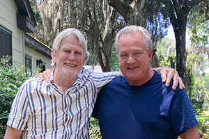 Indian River Magazine Publisher Gregory Enns, right, with Tim Wood outside his house in Beaufort, South Carolina.