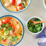 The spicy, aromatic broth of this colorful Brazilian seafood soup is mellowed by rich coconut milk.