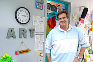 Christopher Sweeney teaches art to K-5th graders at Beachland Elementary School