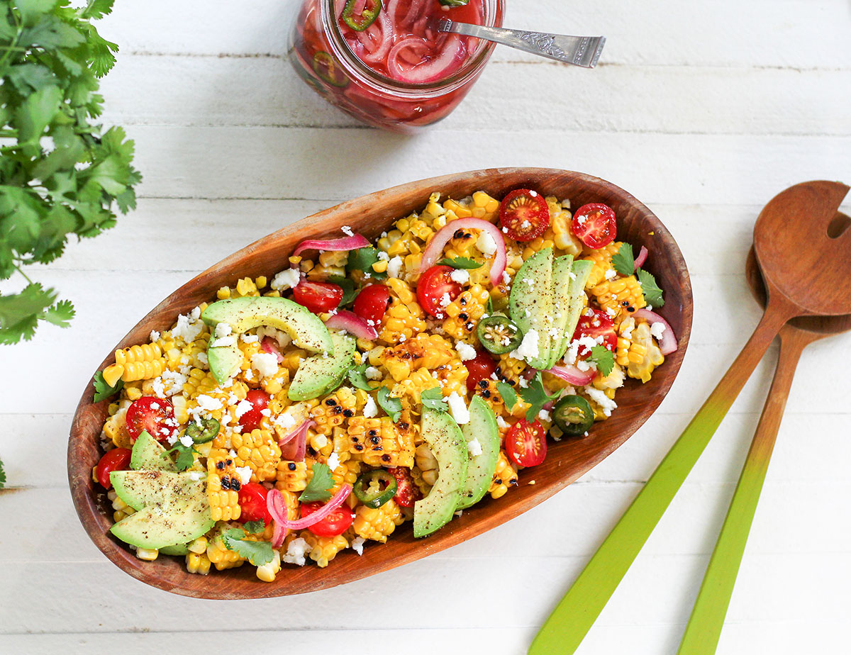 Sweet, smoky charred corn and vibrant veggies make the perfect salad for your next cookout.