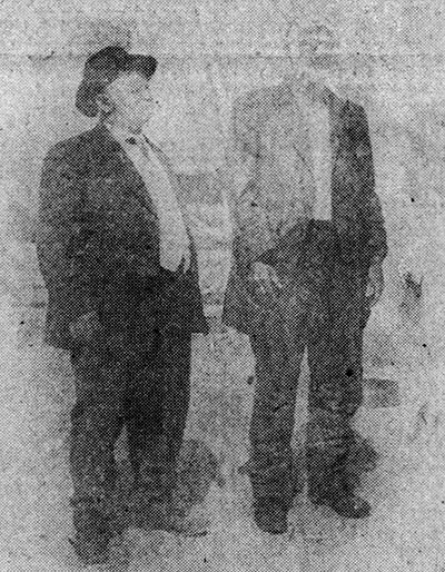 In this faded photograph appearing in Florida newspapers, Sheriff George Baker parades John Ashley after arresting him.