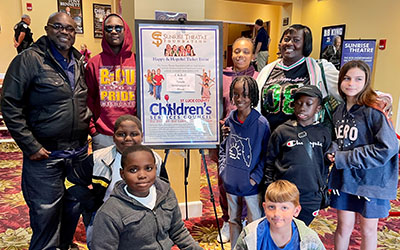 Attendees at a Happy & Hopeful Ticket Event