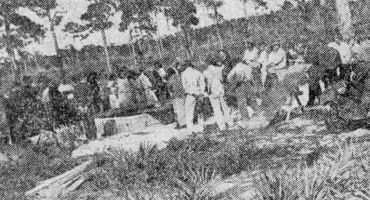 A crowd gathers around the funeral of John Ashley, Ray Lynn and Hanford Mobley in a photo captured by a Miami Herald photographer.