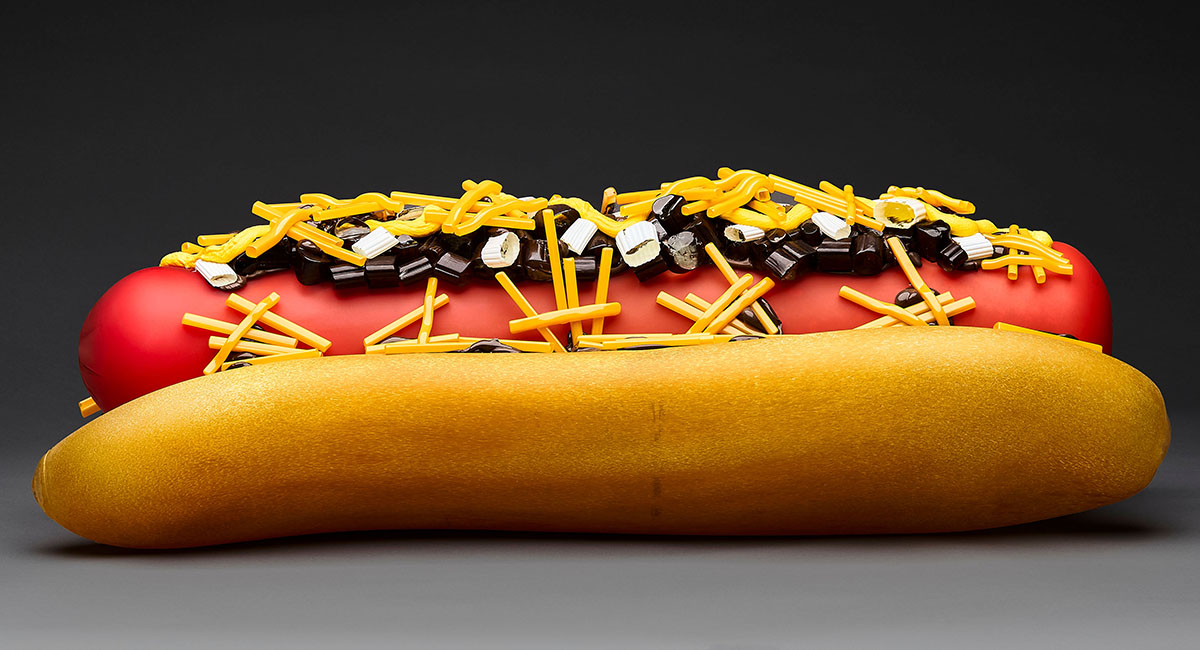 This large-scale chili dog sculpture, displayed at the Vero Beach Museum of Art, is made of hundreds of molded glass pieces, evoking a sense of hunger and nostalgia for a summer cookout.