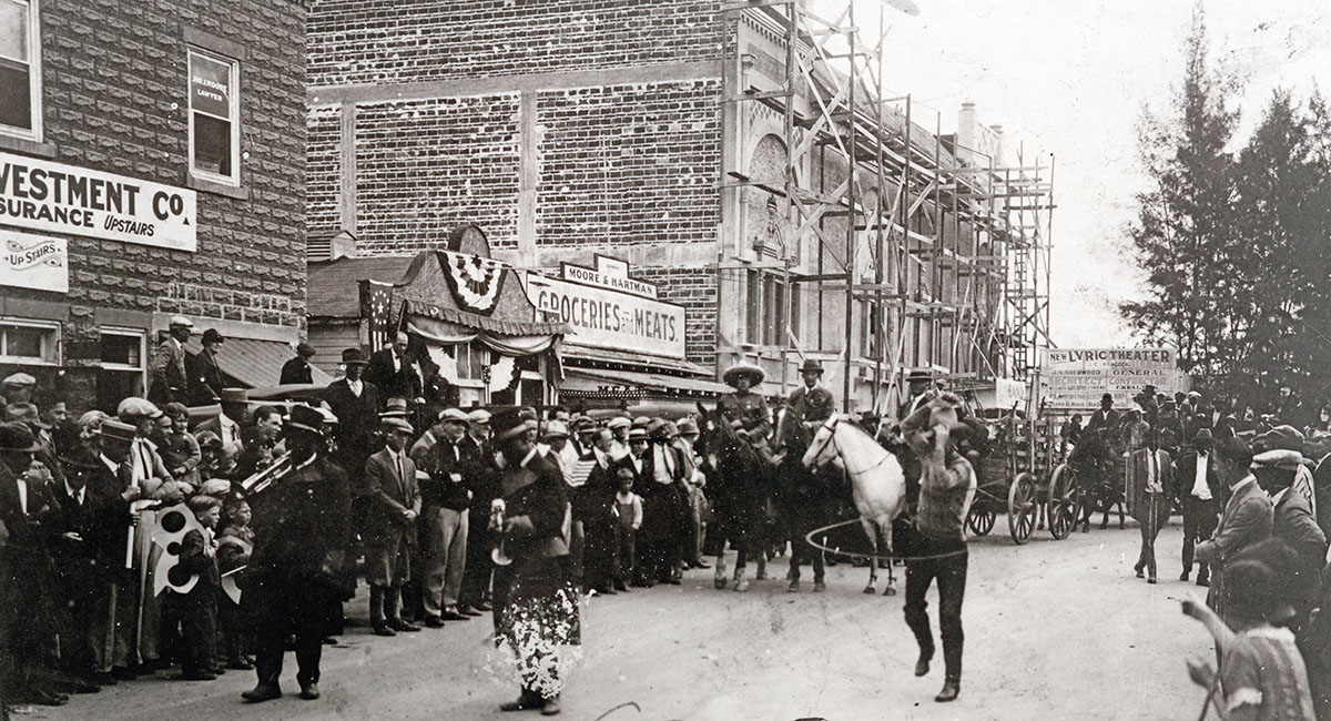While the Lyric Building was under construction in 1925, its front covered with scaffolding, Gov. John W. Martin drew a crowd in downtown Stuart.