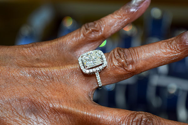 Diamonds sparkle and shine from the finger of a St. Lucie Jewelry and Coins customer, who was considering engagement rings. RUSTY DURHAM