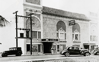 When this photograph was taken in 1938 Frederic March was starring in The Buccaneer, according to a poster in the window.
