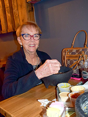 Doris Tillman, executive director of Fort Pierce Main Street, enjoys a lunch break at Taco Dive, a popular downtown eatery.