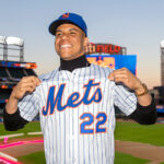 Shortly after signing in December the biggest contract in the history of sports, Juan Soto shows off his new Mets jersey. Last year he was a star for crosstown rival the New York Yankees.